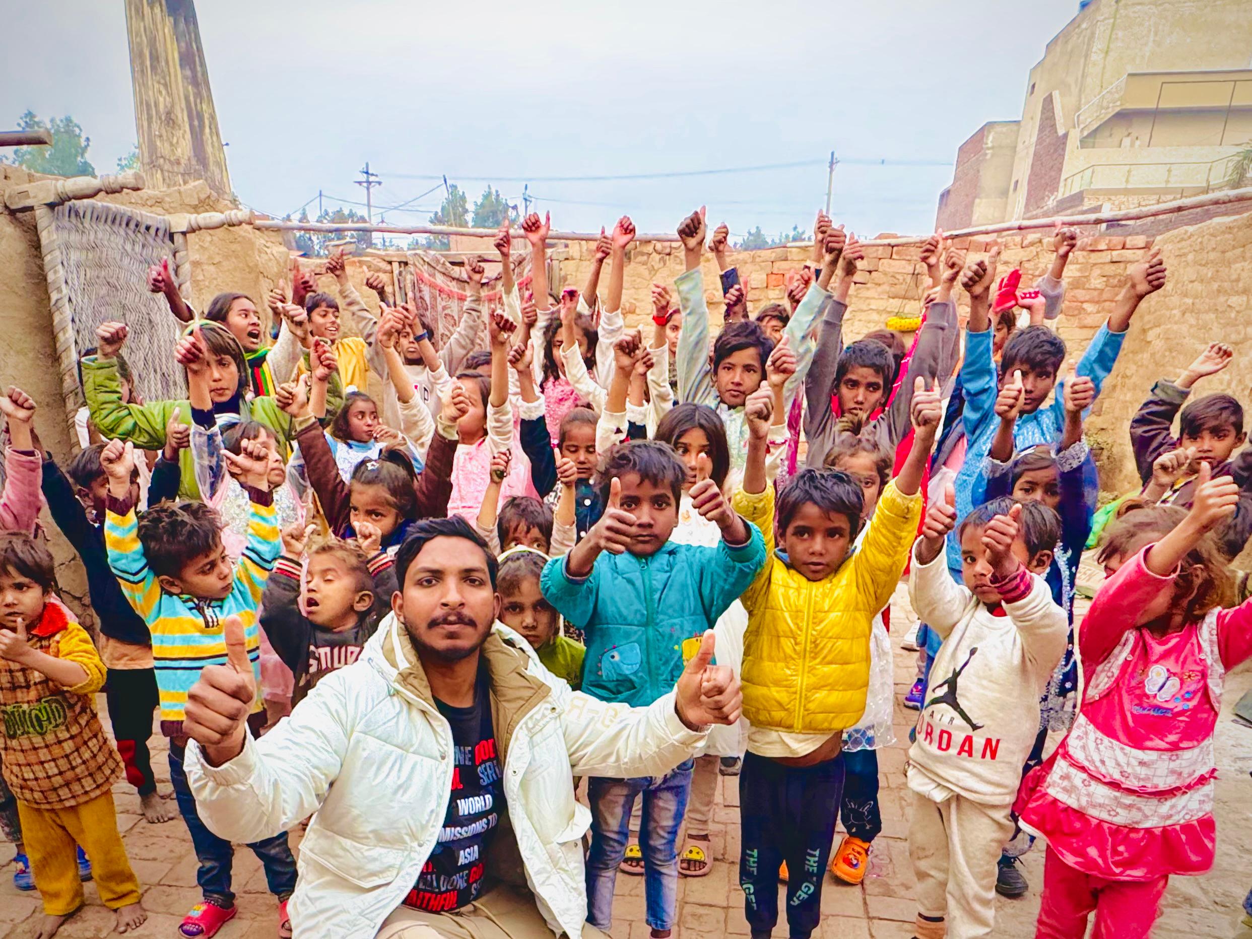 Children and ministry leader gathered during Kingdom First Mission children’s ministry