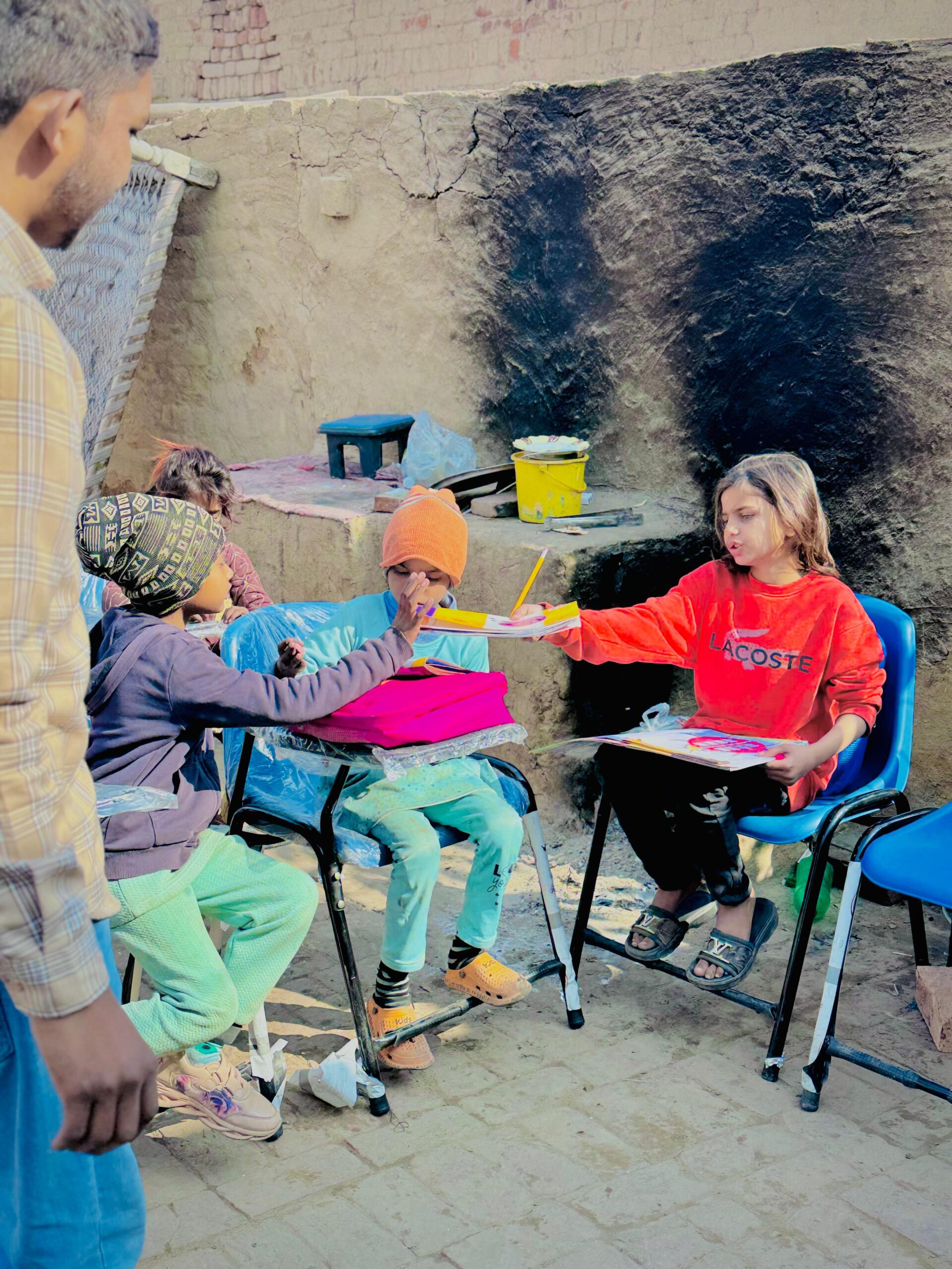 Children learning outdoors through Kingdom First Mission education support