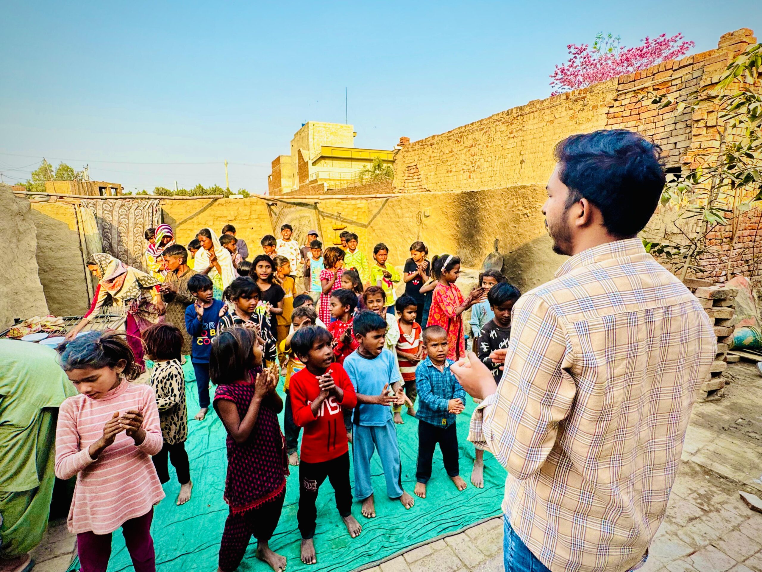 Children gathered during food and Gospel outreach through Kingdom First Mission