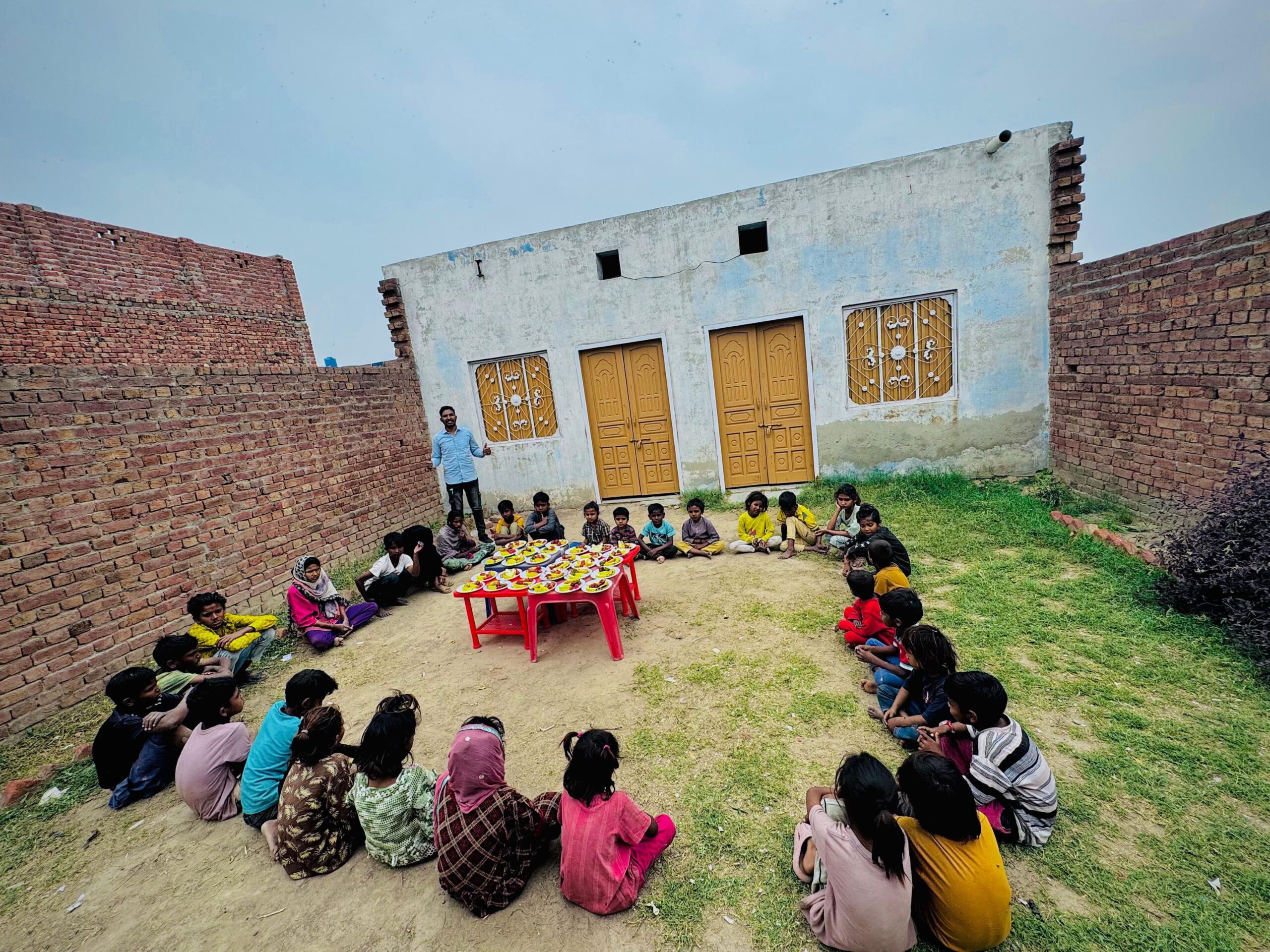 Children gathered for food support through Kingdom First Mission in Pakistan