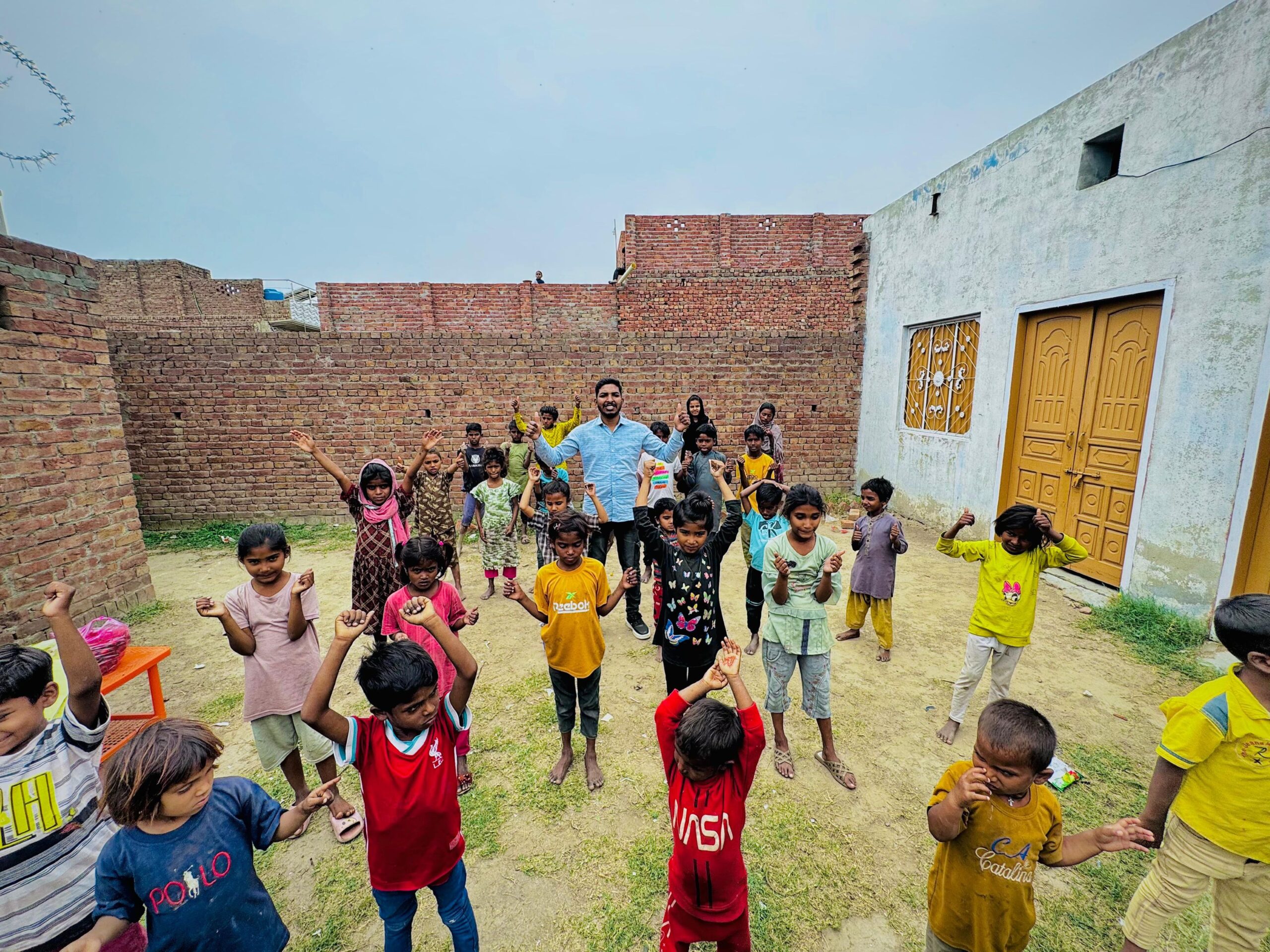 Children praying during Kingdom First Mission outreach in Pakistan